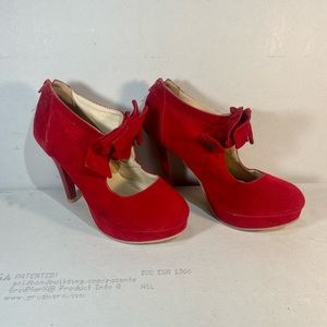 Red bowed heels